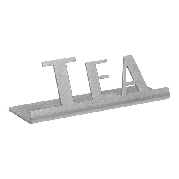 A brushed stainless steel table sign that says "Tea"