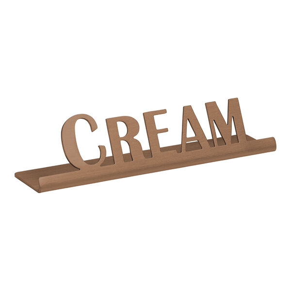A rose gold stainless steel table tent with the word "cream" on it.