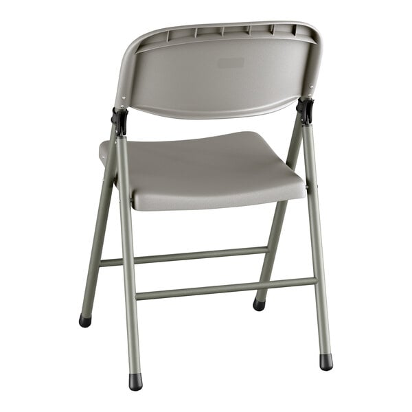 A gray contoured injection-molded folding chair with a charcoal frame and gray legs.