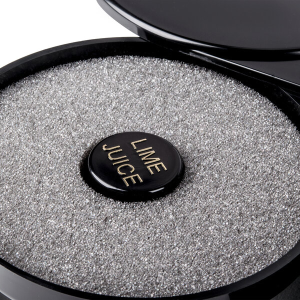 A black round sponge with a black circle in it.