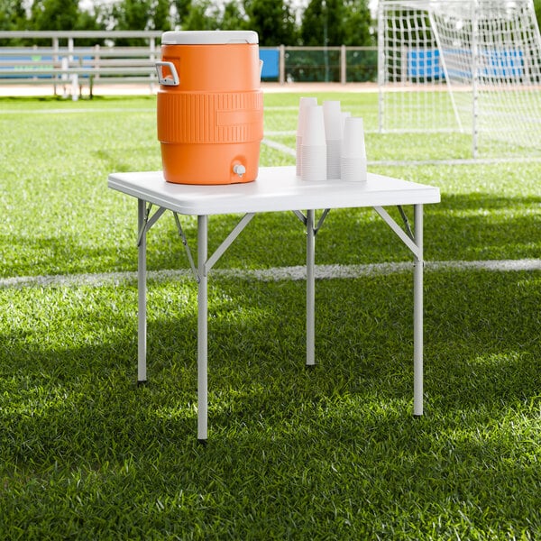 Lancaster Table & Seating 34" Square Granite White Heavy-Duty Blow-Molded Plastic Folding Table with Gray Legs