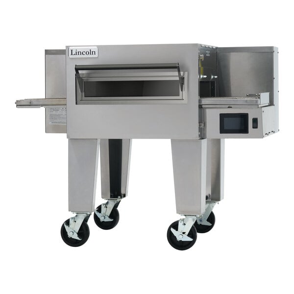 An electric impinger conveyor oven with a stainless steel exterior, wide belt, and caster wheels.