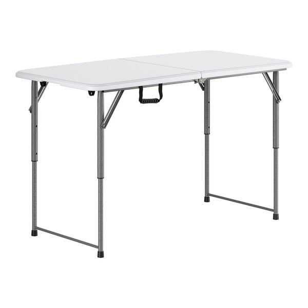 A white rectangular Lancaster Table & Seating bi-folding table with metal legs.