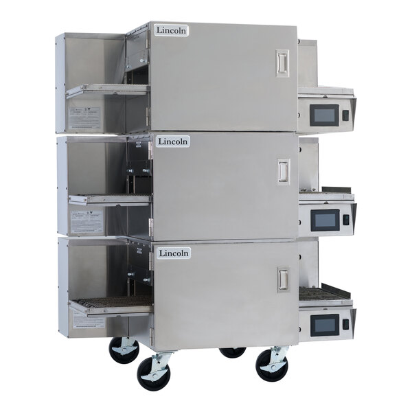A triple-stacked commercial electric conveyor oven with stainless steel construction and digital controls.