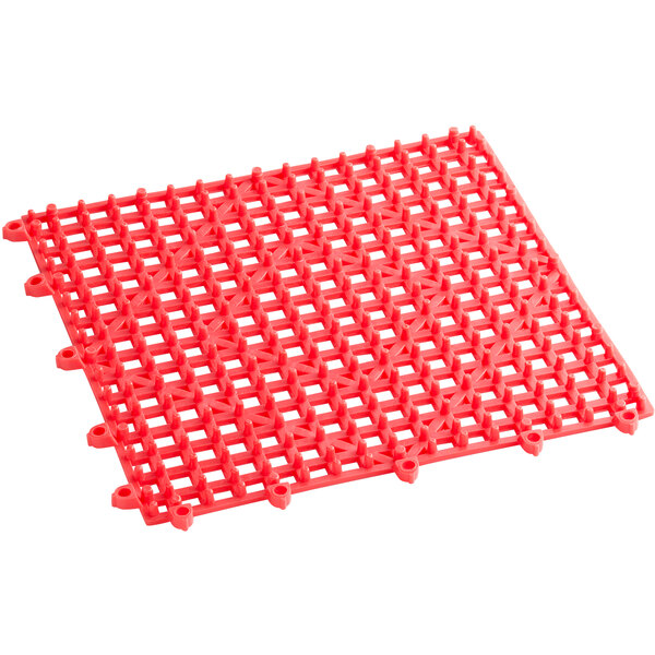 A red plastic Choice interlocking bar mat with holes in it.