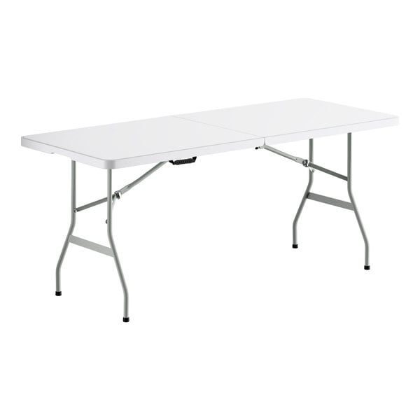 A rectangular bi-folding table with a granite white plastic top and gray metal legs.