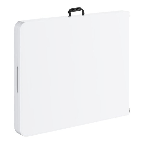A rectangular granite white plastic bi-folding table with gray legs and a black carrying handle.