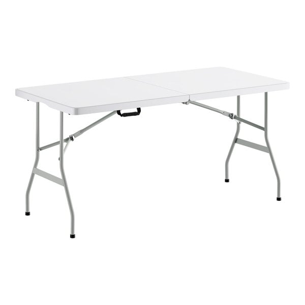 A rectangular granite white plastic bi-folding table with gray metal legs and a carrying handle.