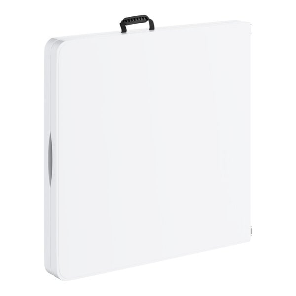 A bi-folding rectangular plastic table with a granite white surface, gray legs, and a carrying handle.