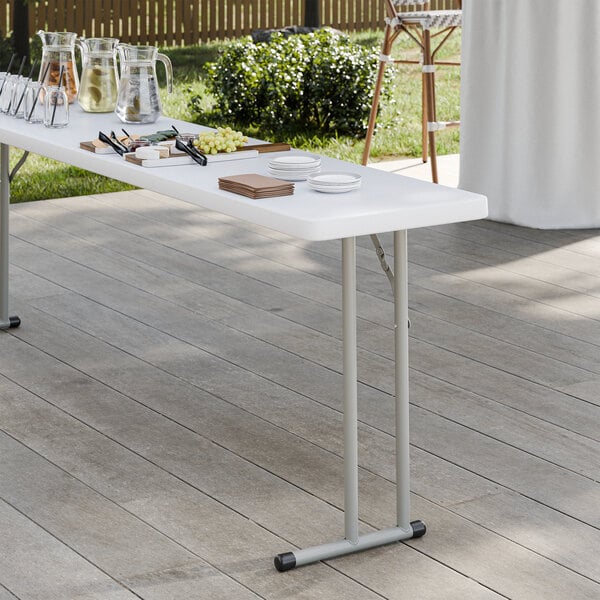 Lancaster Table & Seating 18" x 96" Granite White Heavy-Duty Blow-Molded Plastic Folding Table with Gray Legs