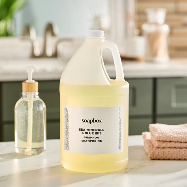 A white jug of Soapbox Sea Minerals and Blue Iris shampoo with a white label.