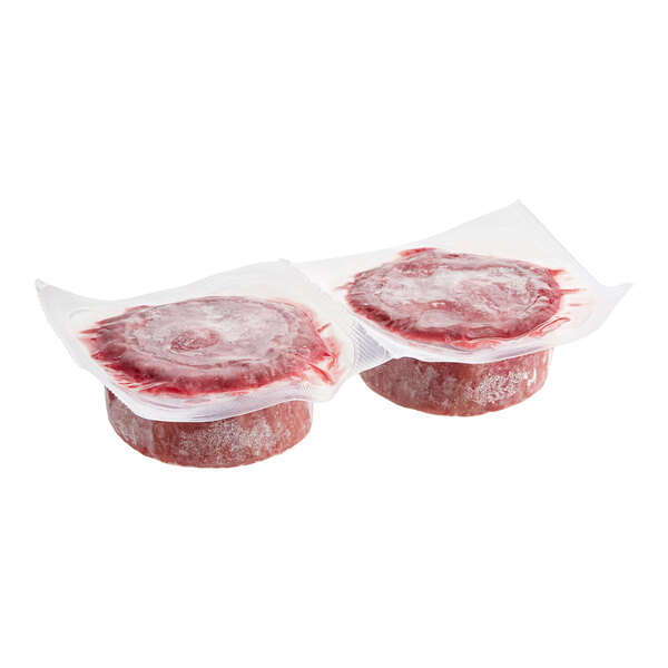 Two pieces of Juicy Marbles plant-based vegan filet in plastic wrappers.