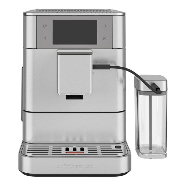 A close-up of a silver Kitchen Aid espresso machine with a black and silver screen.