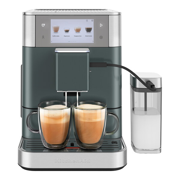 A Kitchen Aid juniper espresso machine with two cups of espresso on the side.