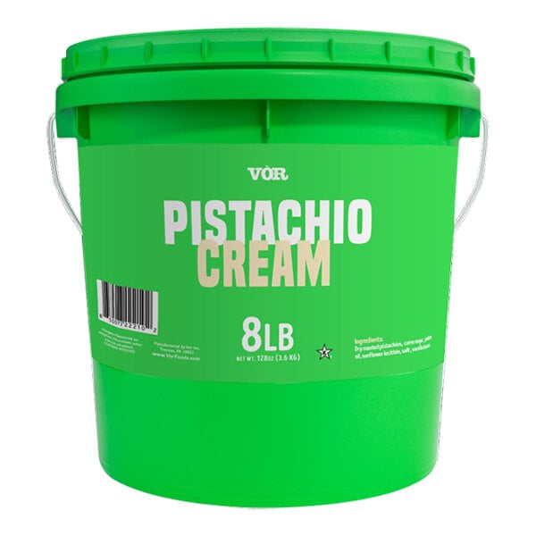 A close up of a green Vor pistachio cream pail with a white label.