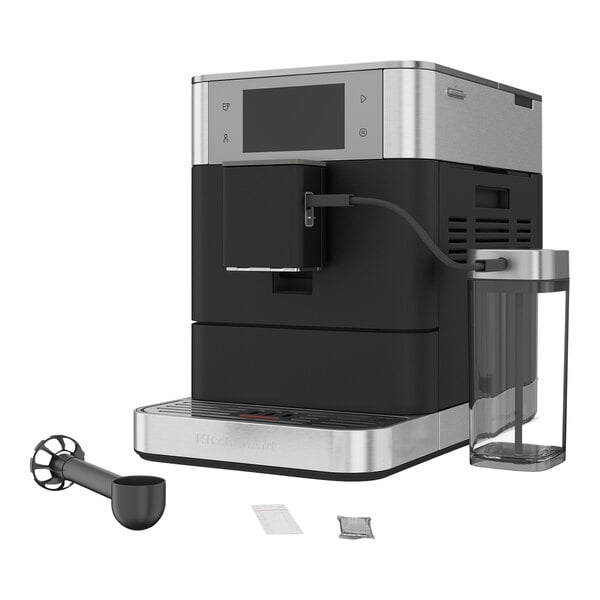 A black and silver Kitchen Aid espresso machine on a counter.