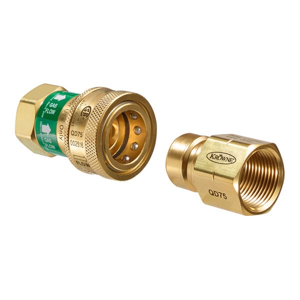 A close-up of a couple of brass Krowne Royal Series QD75 quick disconnect fittings with green threads.