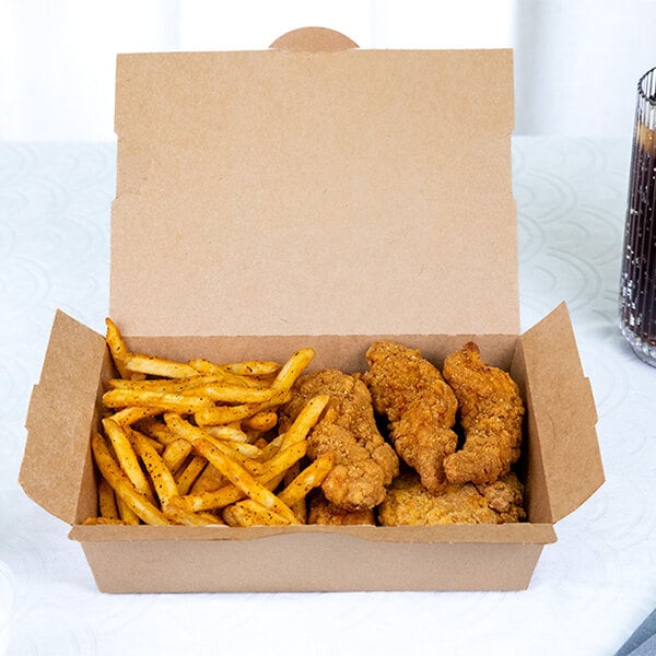 A Southern Champion take-out box with fried chicken and french fries.