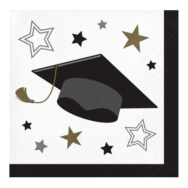 A white Creative Converting beverage napkin with a black graduation cap and stars.