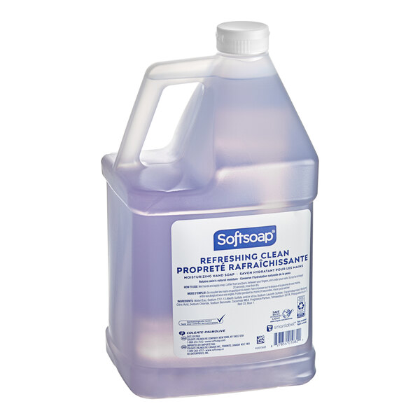 A plastic jug of Softsoap liquid hand soap with a label on it.