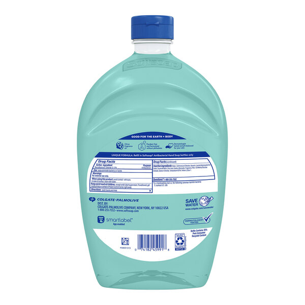 A close-up of a Softsoap Fresh Citrus Scent Antibacterial Liquid Hand Soap refill bottle with a blue label.