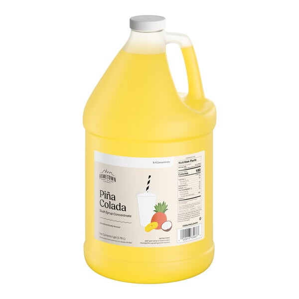 A one-gallon jug of Hometown Provisions Piña Colada slushy syrup concentrate.