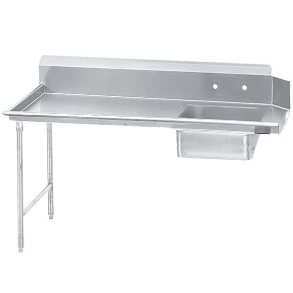 A white rectangular stainless steel Advance Tabco dishtable with a sink on the left.