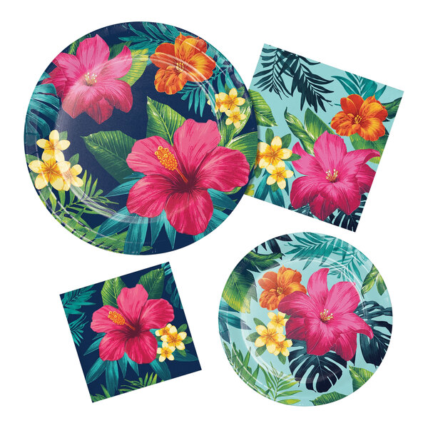 A set of Tropic Time paper napkins on a table with tropical party plates and flowers.