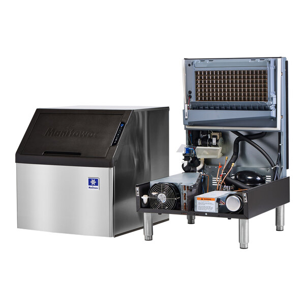 A Manitowoc undercounter ice machine with a black and silver box.