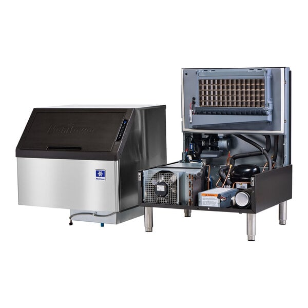A large silver Manitowoc undercounter ice machine with a black lid.