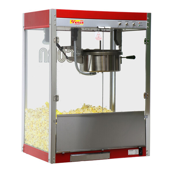 A red and white Paragon Classic Countertop Popcorn Machine with a silver top and a container of popcorn.