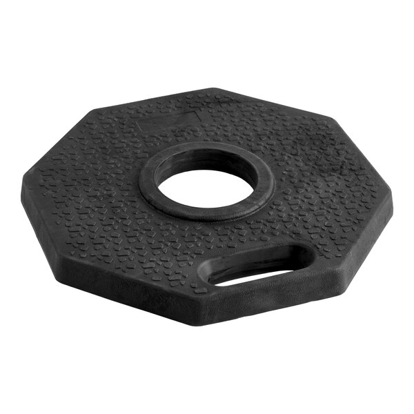 A black, octagonal weighted delineator base with a central hole and a built-in handle.