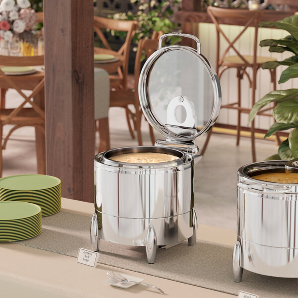 An Acopa stainless steel chafer stand with food inside.