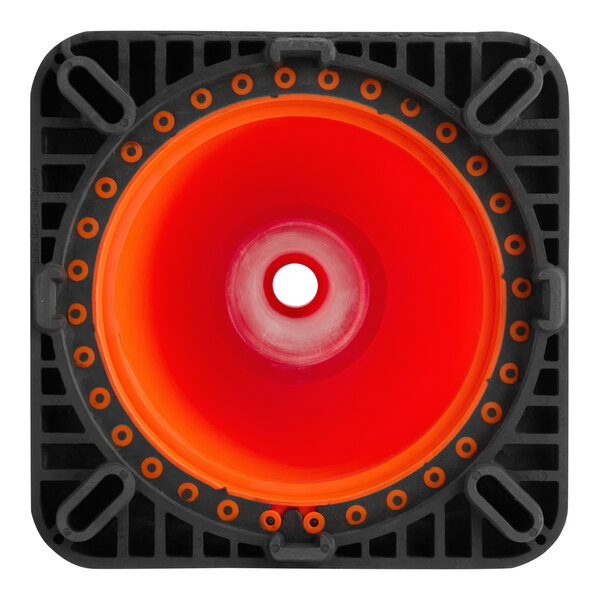 A square-based orange PVC traffic cone with a central hole and high-visibility reflective collars.