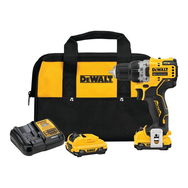 A yellow and black DeWalt drill with a black and yellow battery charger and yellow and black tool bag.