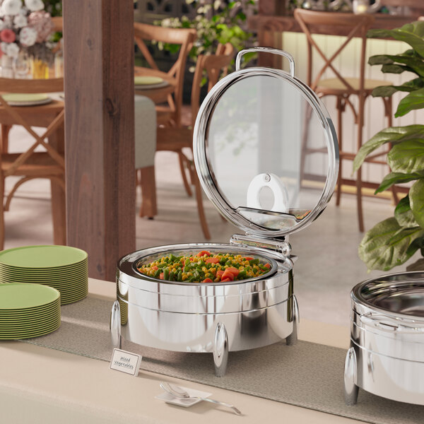 An Acopa stainless steel chafer stand with a fuel holder holding a silver pot of food.