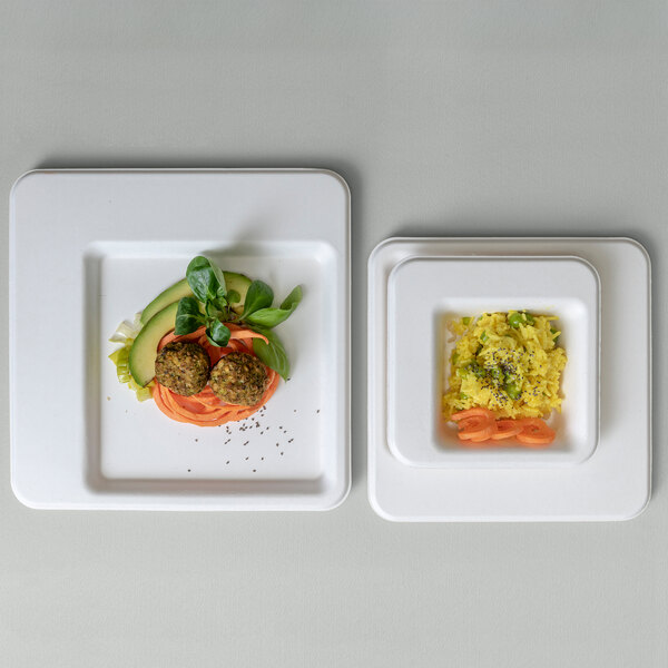Two Jungle Diamond square compostable sugarcane pulp plates with food on them.