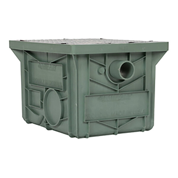 A close-up of a green plastic container with holes.