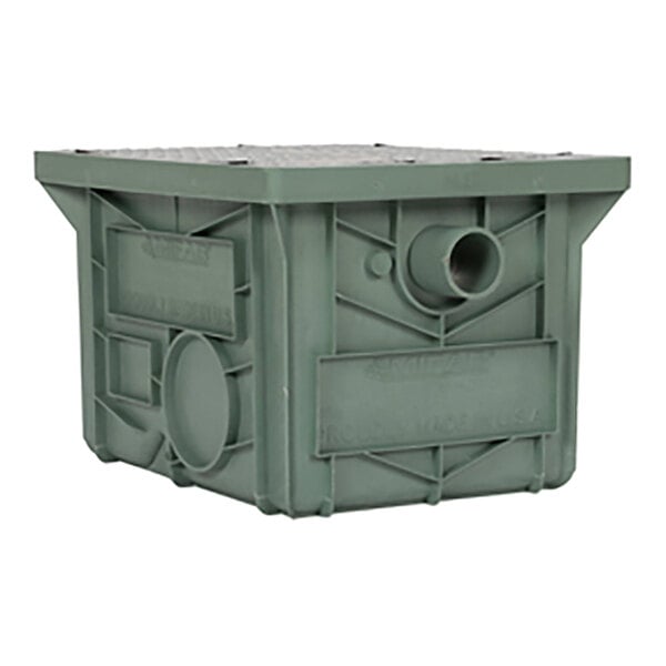 A close-up of a green plastic container with holes.