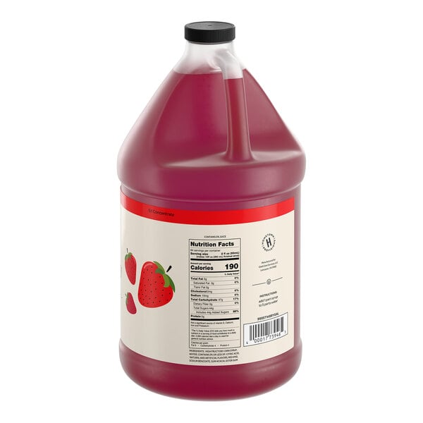 A one-gallon jug of Hometown Provisions strawberry beverage concentrate.