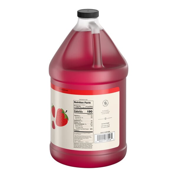 A one-gallon jug of Hometown Provisions strawberry beverage concentrate.