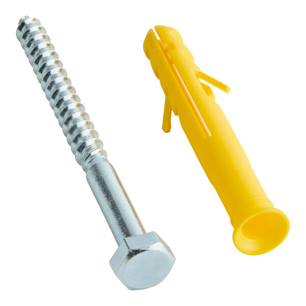 A metal screw and a yellow plastic anchor for securing parking stops.