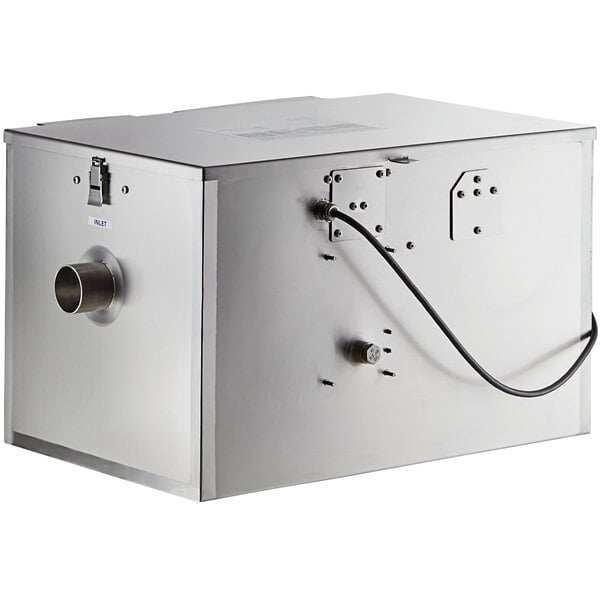 A rectangular metal Grease Guardian box with a black power cord.