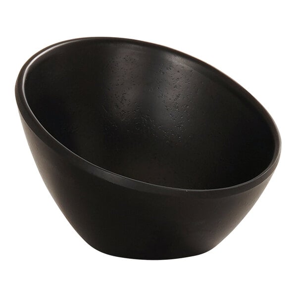 A close-up of a black Cal-Mil slanted melamine bowl on a white background.
