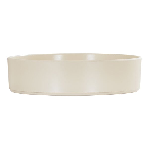 A large ivory melamine bowl with a raised rim.