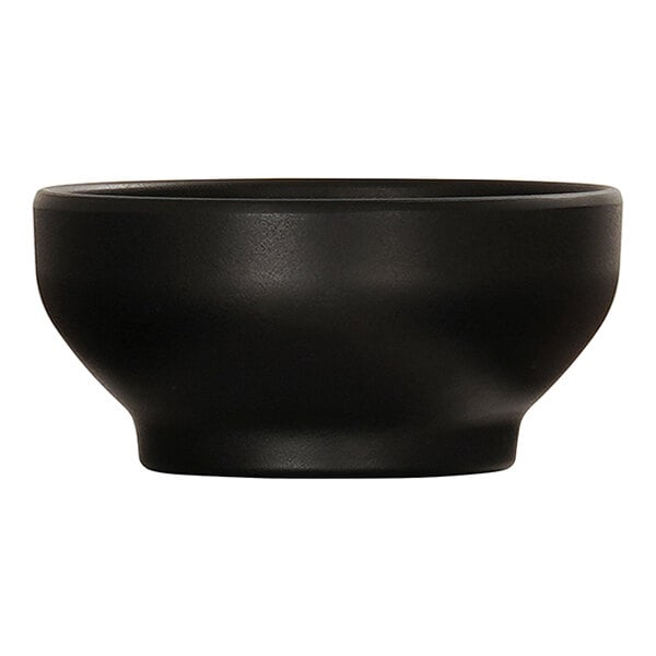 A close up of a black Cal-Mil melamine soup bowl.