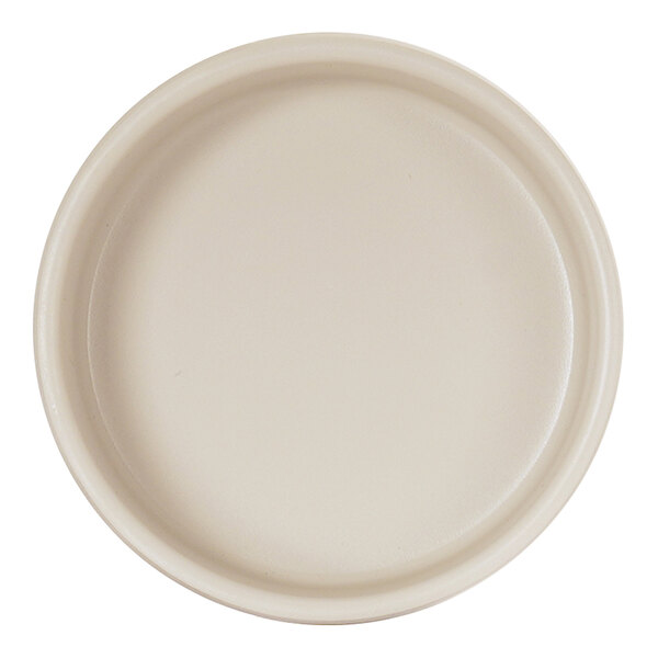 A round, ivory-colored melamine ramekin with straight sides.