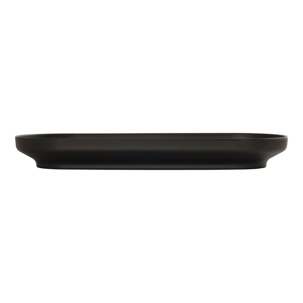 A black oval Cal-Mil melamine platter with a white stripe.