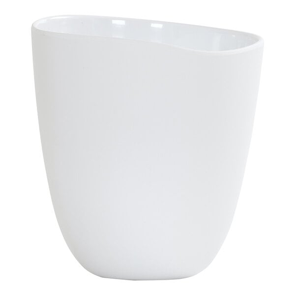 A white round melamine dressing crock with a smooth finish.