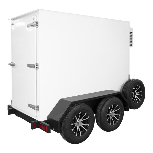 A white box with wheels and a door.